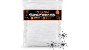 The image shows a spooky Halloween display featuring a best-selling spider web kit with fake spiders.