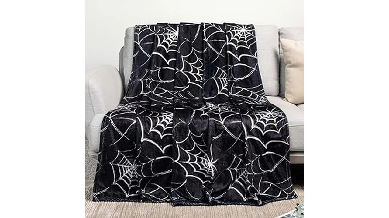 The image shows a cozy blanket with a Halloween theme, highlighting popular picks.